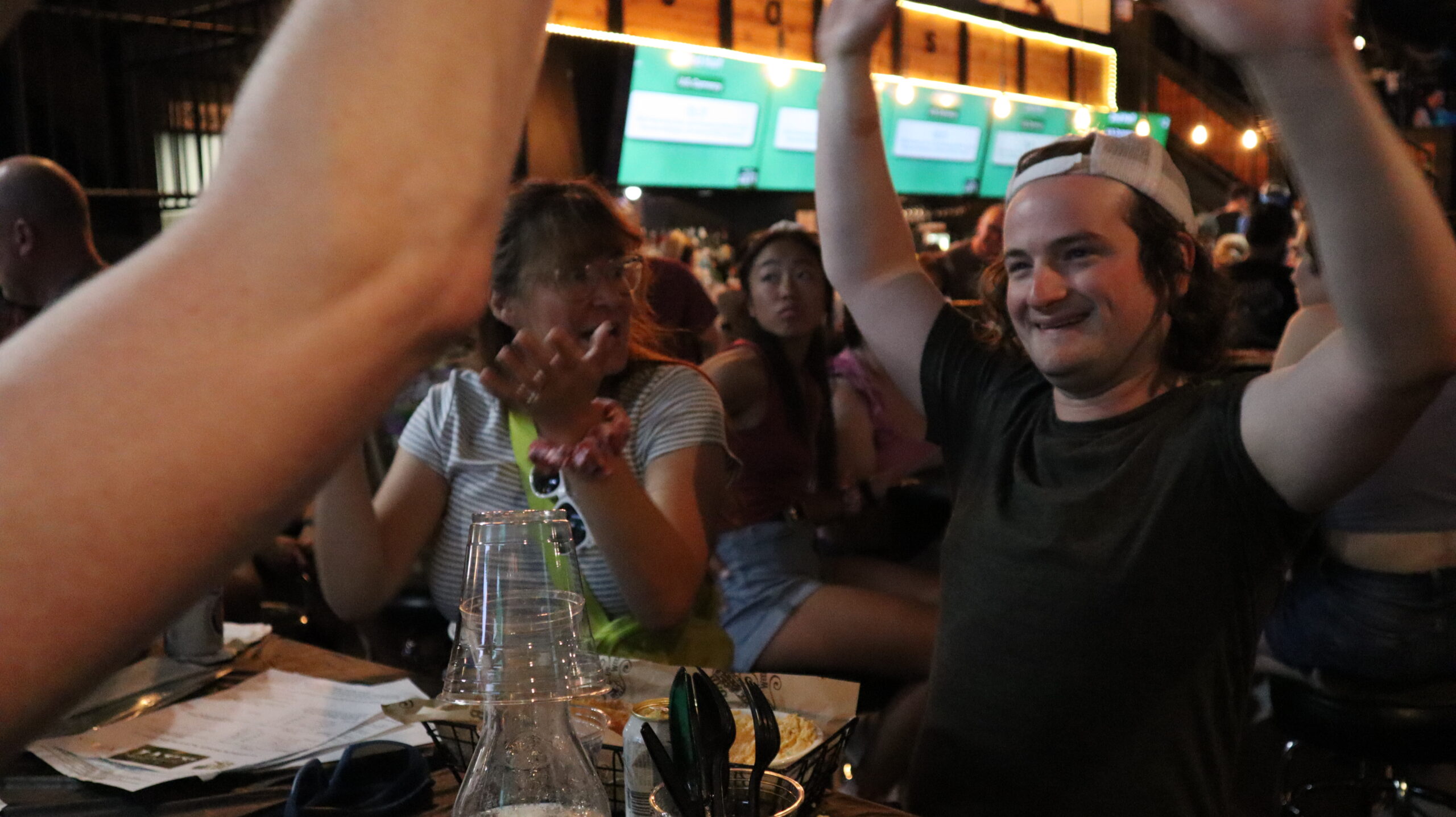 TOC teammates celebrating a correct answer