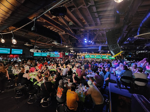 a group of people in a large space