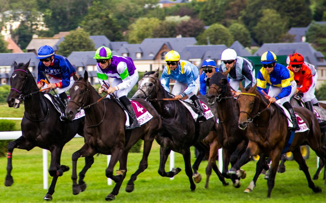 group of people riding horses